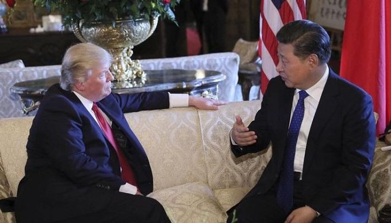 ترامب مع رئيس الصين في لقاء سابق