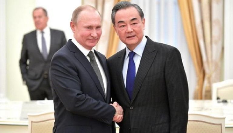 بوتين يلتقي وزير الخارجية الصيني في موسكو 