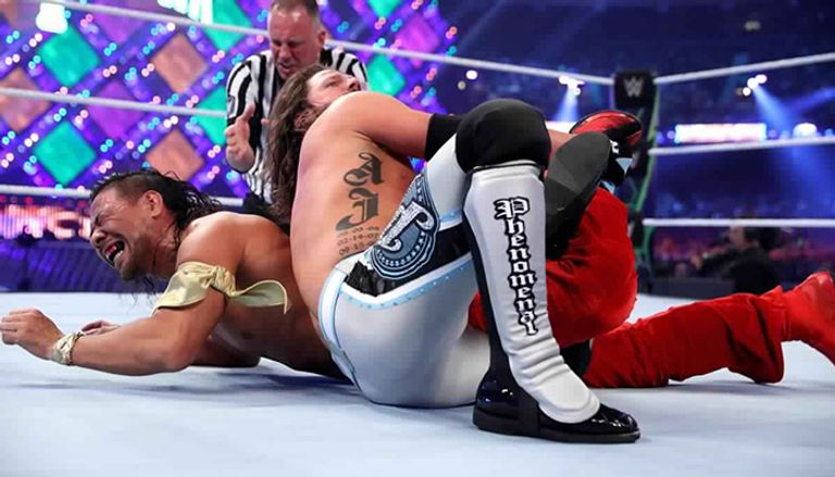 ناكامورا يعطي حزام البطولة إلى ستايلز