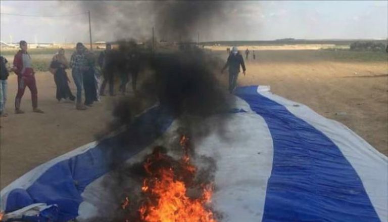 جمعة حرق علم إسرائيل شعار مسيرة العودة هذا الأسبوع