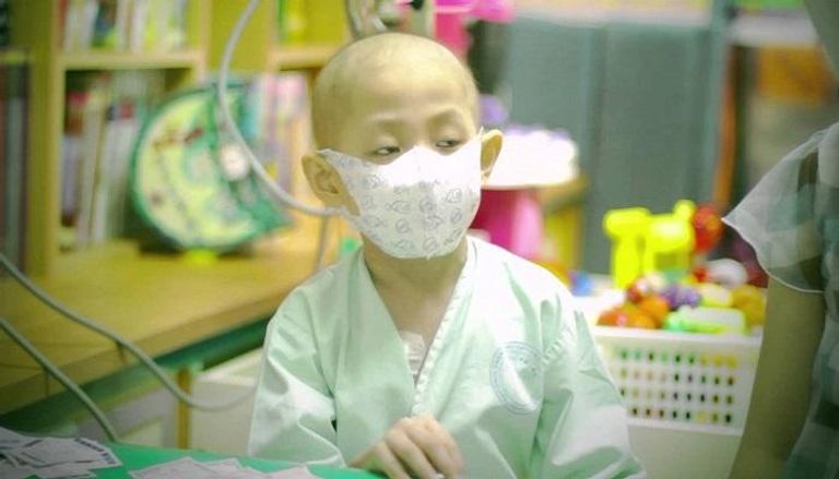 طفل صيني مريض بالسرطان