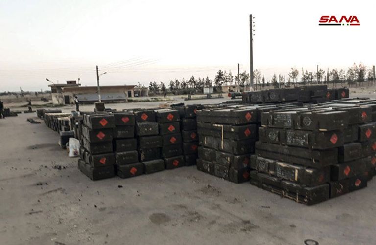 صور أسلحة ثقيلة كانت في حوزة الفصائل المسلحة عناصر من القوات المسلحة عند خروجهم للشمال السوري - أرشيفية