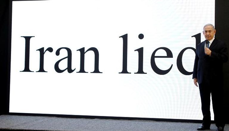 نتنياهو خلال حديثه عن إيران في المؤتمر الصحفي- رويترز