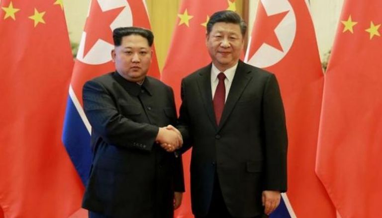 الرئيس الصيني شي جينبينج وزعيم كوريا الشمالية كيم جونج أون