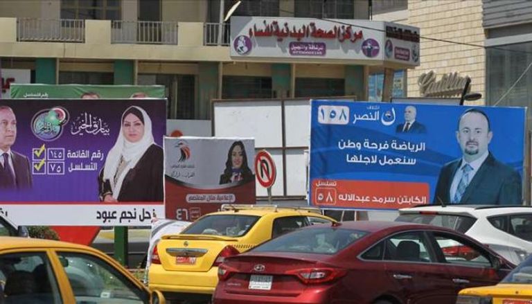 ملصقات دعاية للمرشحين في الانتخابات العراقية
