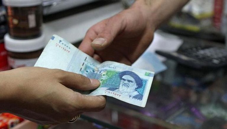 هبوط الريال الإيراني أمام الدولار