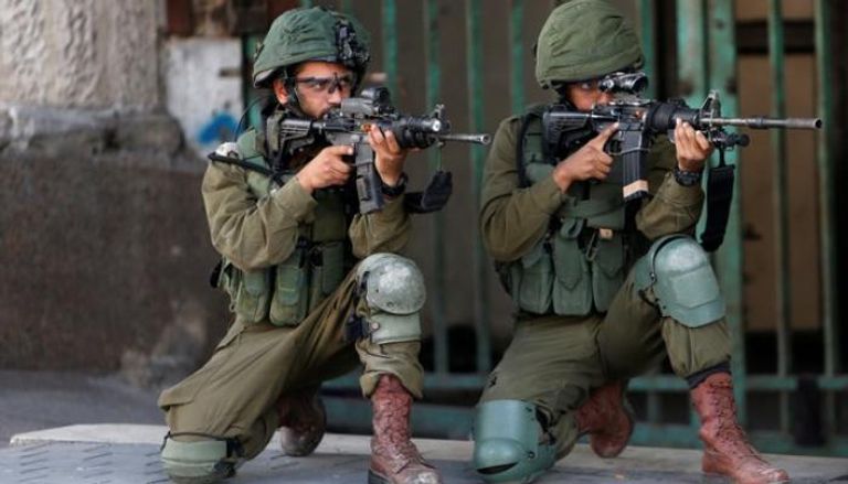 جنود إسرائيليون يطلقون النار باتجاه مسيرة فلسطينية بالخليل في ذكرى النكبة