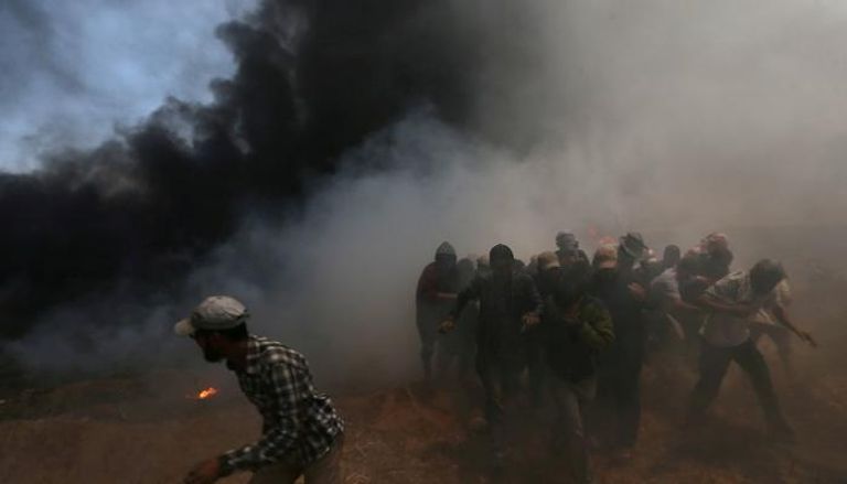 جانب من المواجهات بين الفلسطينيين وقوات الاحتلال 