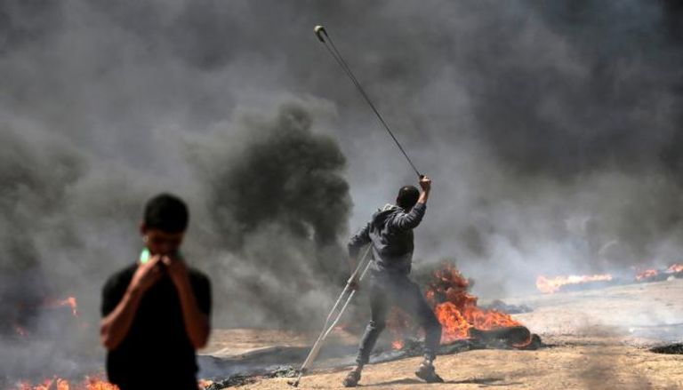 فلسطيني خلال المواجهات مع قوات الاحتلال