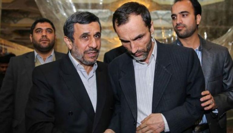 الرئيس الإيراني السابق أحمدي نجاد ونائبه حميد بقائي- أرشيفية