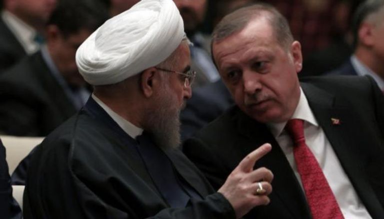 الرئيس التركي رجب أردوغان ونظيره الإيراني حسن روحاني- أرشيفية