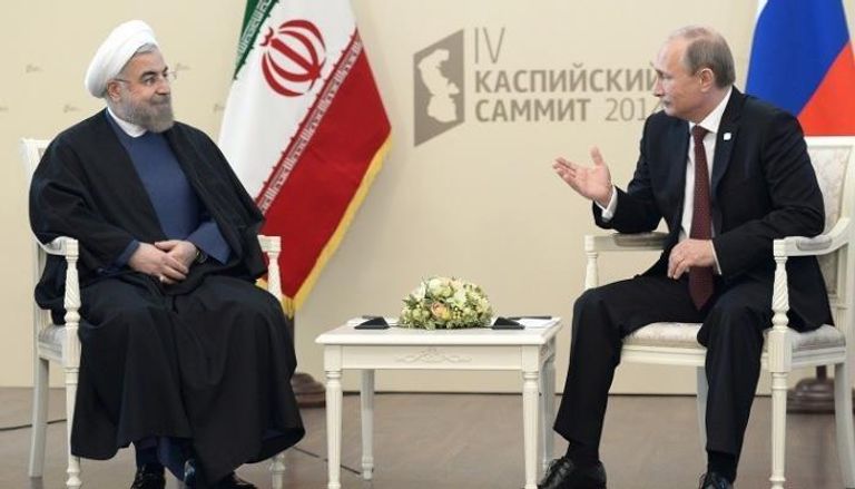 الرئيسان الروسي فلاديمير  بوتين والإيراني حسن روحاني -أرشيفية