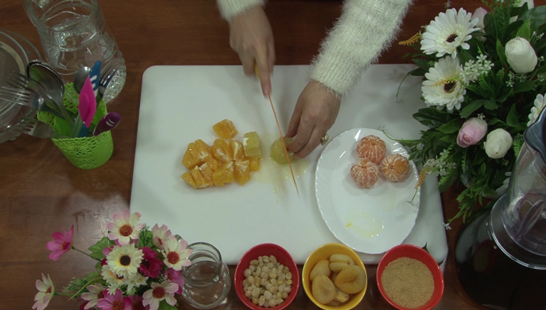 تقطيع الليمون عصير الحمضيات والفواكه المجففة