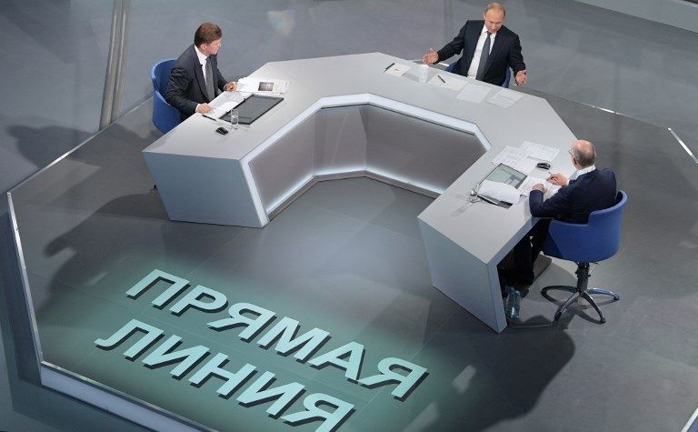 الرئيس الروسي فلاديمير بوتين أثناء الحوار الرئيس الروسي فلاديمير بوتين أثناء الحوار