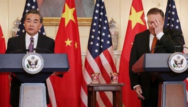 مؤتمر صحفي سابق لوزير الخارجية الأمريكي ونظيره الصيني 