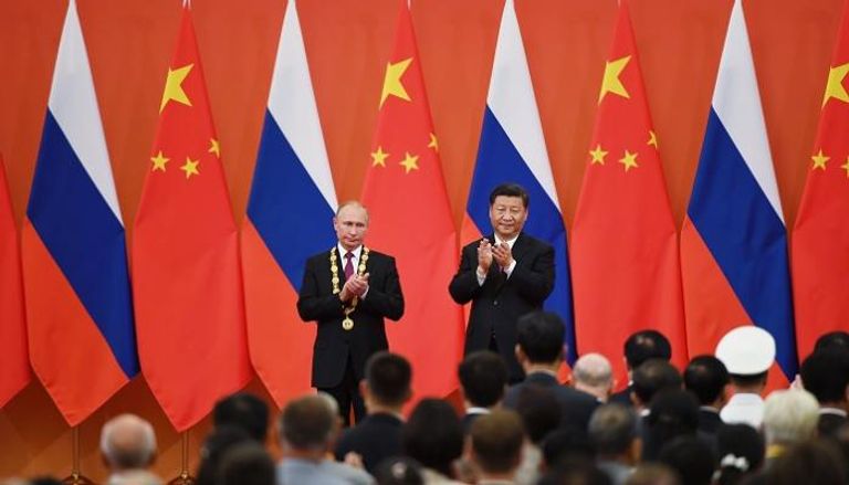 الرئيس الصيني ونظيره الروسي في قاعة الصداقة ببكين