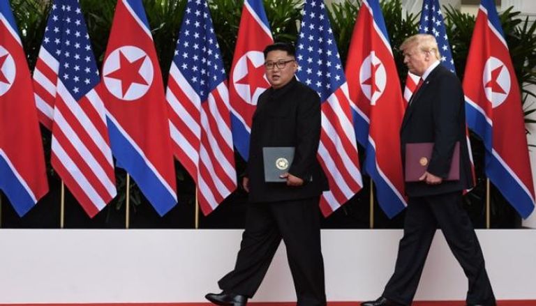 الرئيسان الأمريكي والكوري الشمالي-رويترز