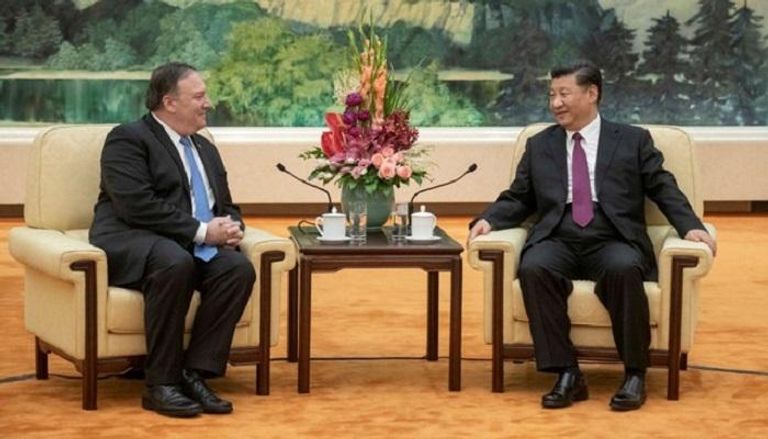 الرئيس الصيني مع وزير الخارجية الأمريكي - رويترز