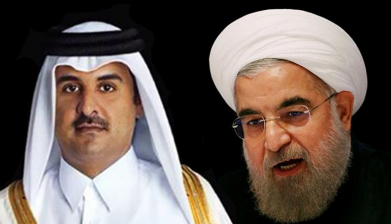 أمير قطر تميم بن حمد والرئيس الإيراني حسن روحاني 