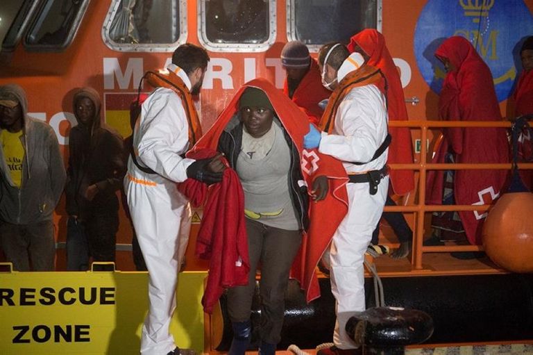 ماكرون وميركل خلال القمة الأوروبية بشأن الهجرة