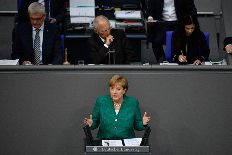 ميركل متحدثة أمام مجلس النواب الألماني ميركل خلال حديثها أمام مجلس النواب الألماني