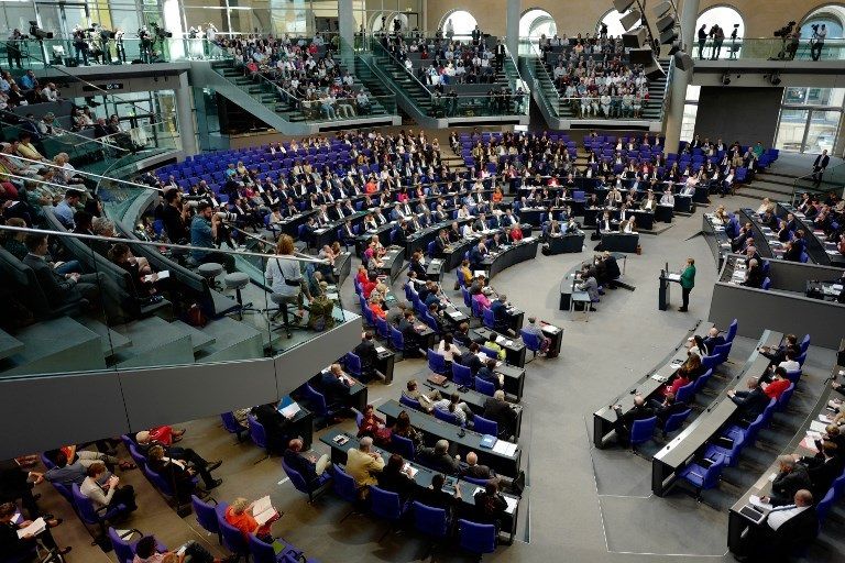 ميركل متحدثة أمام مجلس النواب الألماني ميركل خلال حديثها أمام مجلس النواب الألماني