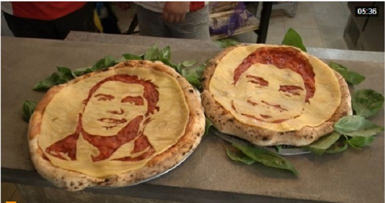 طاهٍ يستخدم صورتي سواريز ورونالدو للترويج للبيتزا بمطعمه