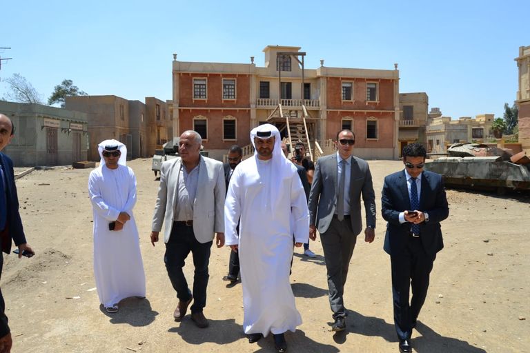 محمود الهاشمي وأسامة هيكل في أثناء توقيع البروتوكول