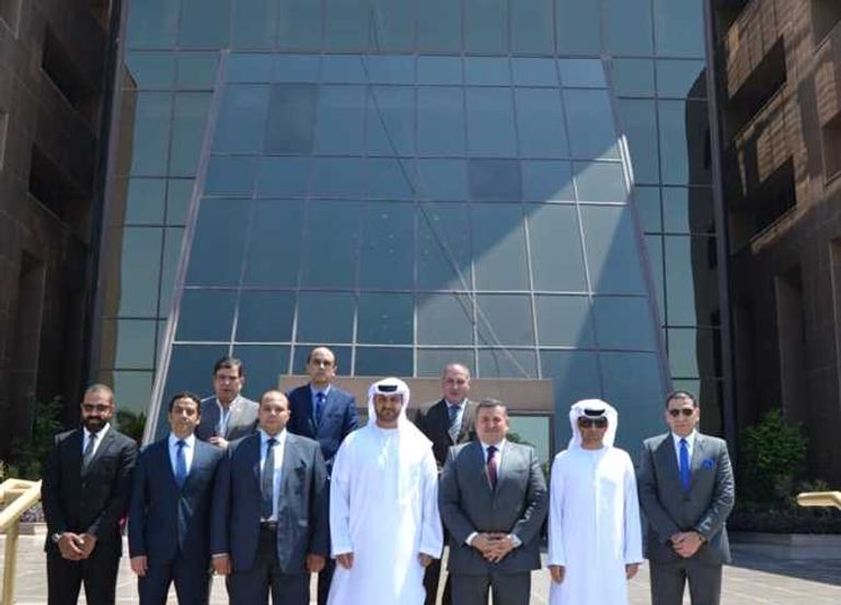 محمود الهاشمي وأسامة هيكل في أثناء توقيع البروتوكول