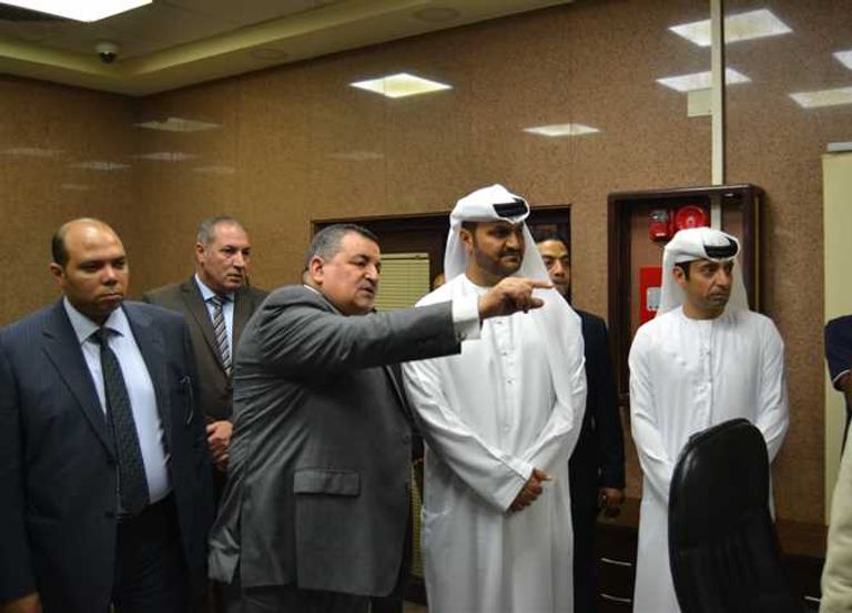 محمود الهاشمي وأسامة هيكل في أثناء توقيع البروتوكول