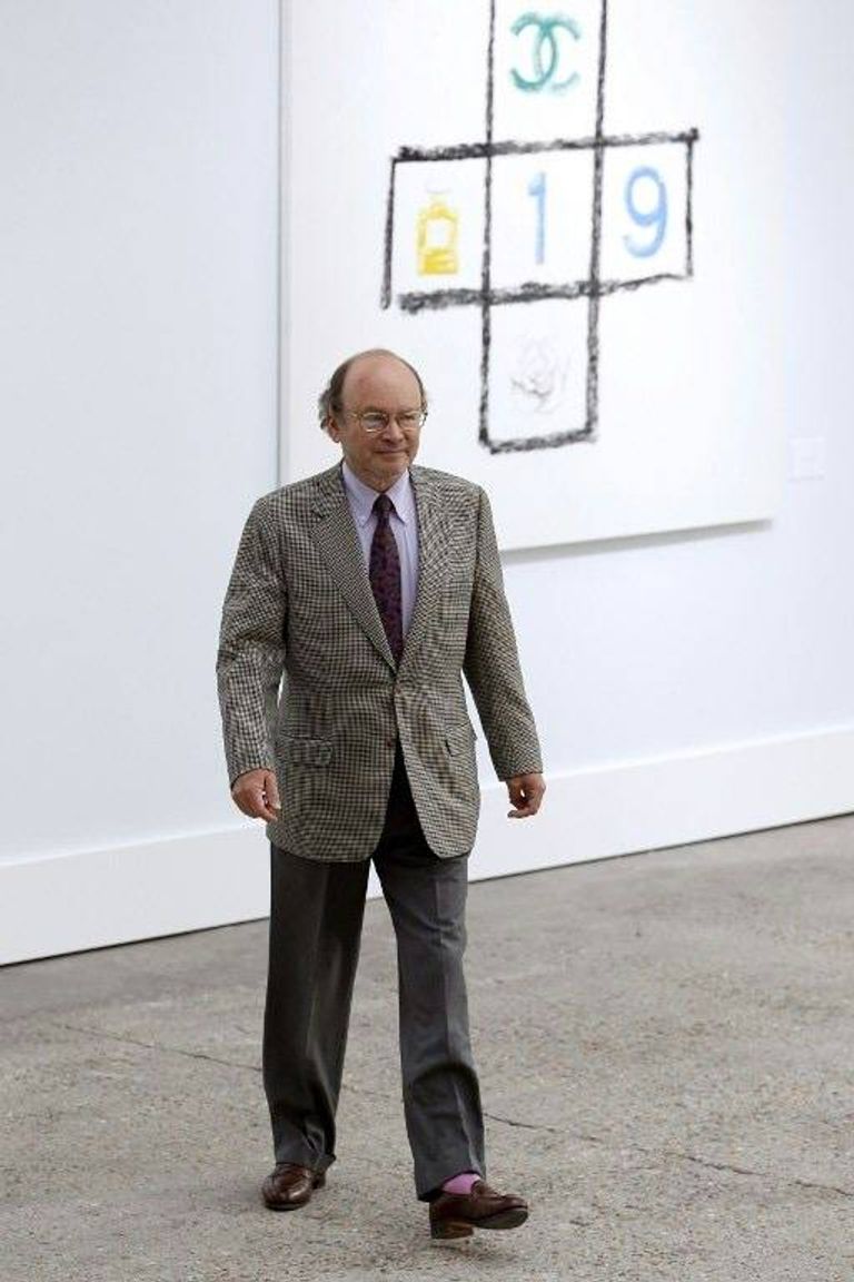 آلان ويرثيمر الرجل الأغنى في فرنسا برنارد أرنو والرئيس الفرنسي إيمانويل ماكرون