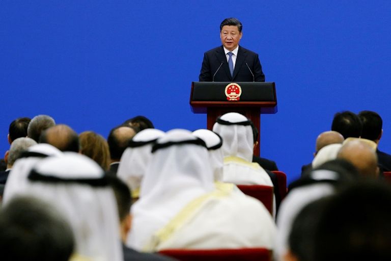 الرئيس الصيني خلال إلقاء كلمة الافتتاح - رويترز الرئيس الصيني خلال إلقاء كلمة الافتتاح - رويترز