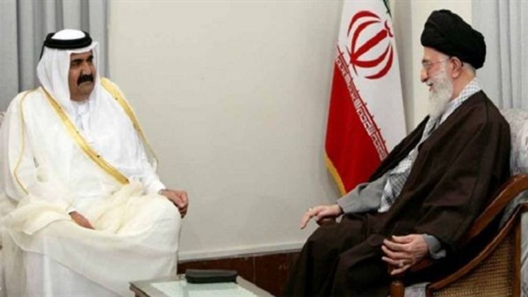 أمير قطر تميم بن حمد والرئيس الإيراني حسن روحاني