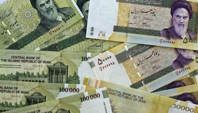 عملات إيرانية فئة 50 و100 ألف ريال 