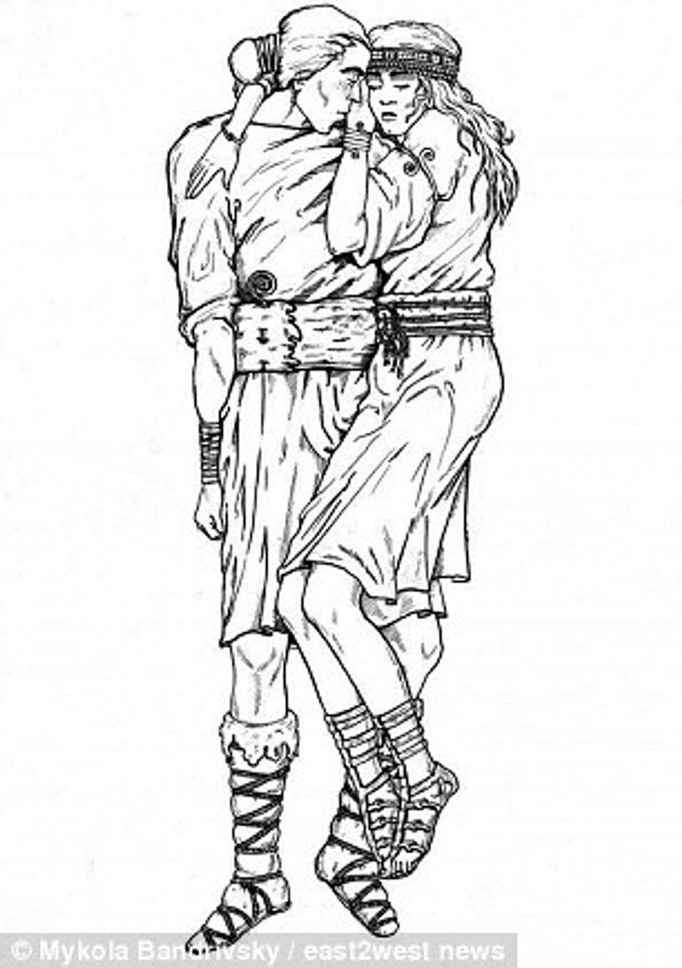 قبر في أوكرانيا لرجل وامرأة دفنا متعانقين