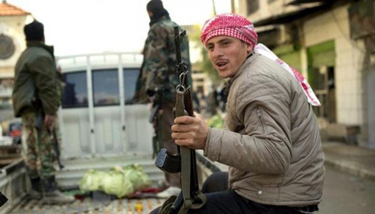 مسلحون تابعون لإحدى فصائل المعارضة بسوريا- أرشيفية