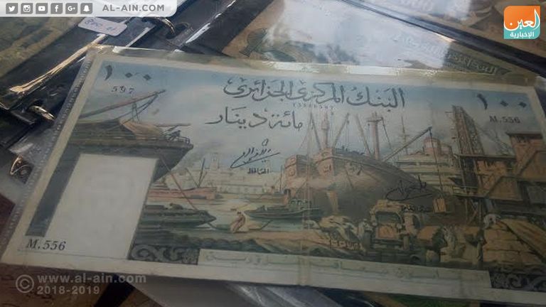 ورقة نقدية جزائرية قديمة من فئة 100 دينار - رسم محمد إيسياخم - الزربية أوراق نقدية عربية قديمة
