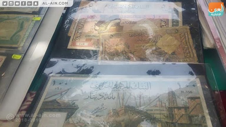 ورقة نقدية جزائرية قديمة من فئة 100 دينار - رسم محمد إيسياخم - الزربية أوراق نقدية عربية قديمة