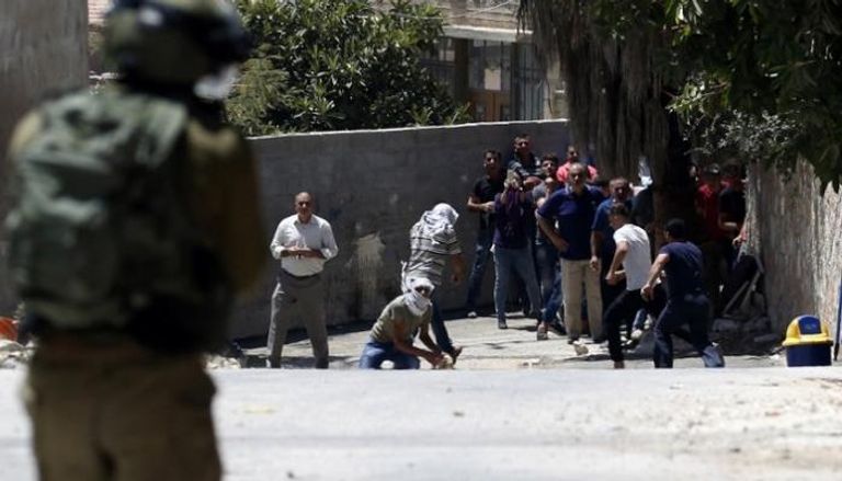 مواجهات بين مصلين فلسطينيين وقوات الاحتلال في المسجد الأقصى - أ. ف. ب