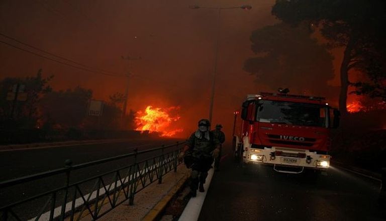 جانب من الحرائق التي تعرضت لها الغابات قرب العاصمة اليونانية 
