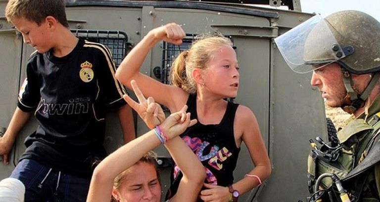 عهد التميمي وجه المقاومة الفلسطينية الأبي يعانق الحرية