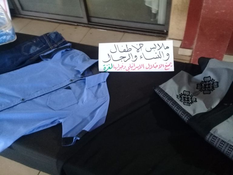 ملابس معروضة يمتع الاحتلال الإسرائيلي دخولها بسبب غلق معبر كرم أبو سالم