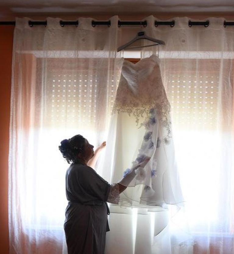 أول أتيليه في إيطاليا لتصميم فساتين زفاف الممتلئات