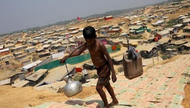 طفل في أحد مخيمات اللاجئين ببنجلاديش - رويترز