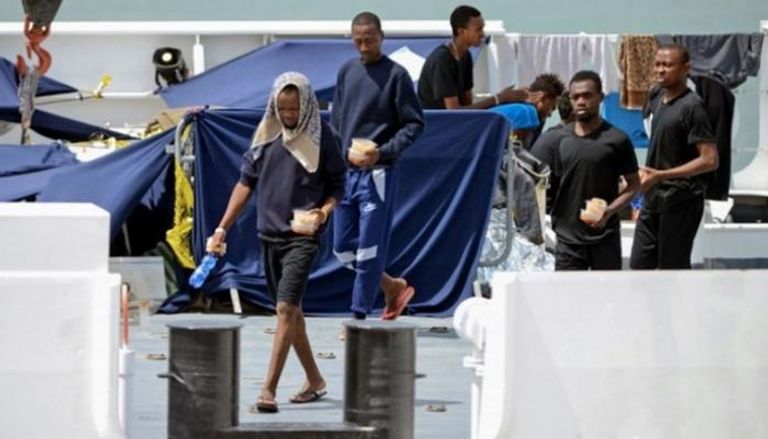 المهاجرون على متن السفينة ديتشوتي - أ. ف. ب