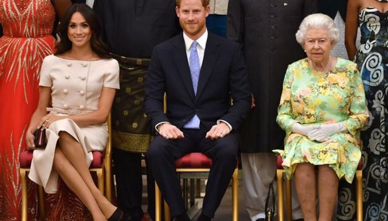 الأمير هاري وزوجته ميجان برفقة الملكة إليزابيث
