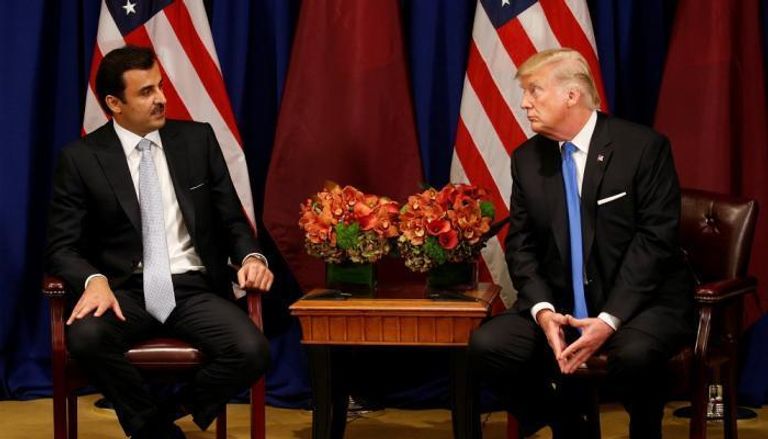 الرئيس الأمريكي وأمير قطر في لقاء سابق