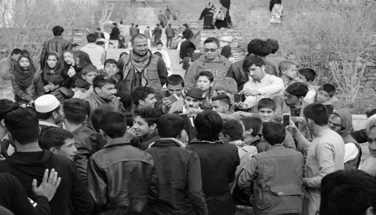 كريم آسر، الملقب بشارلي شابلن أفغانستان مع الجماهير