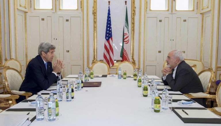 وزير الخارجية الأمريكي الأسبق ونظيره الإيراني - أرشيفية