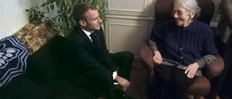 ماكرون مع أرملة ماكرون في بيتها حركة جزائريون في فرنسا- أرشيفية